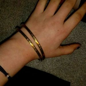 2 golden bracelets